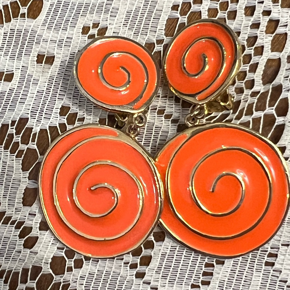 1960s Double Hypnotic Swirl dangle drop orange & gold tone trim clip earrings